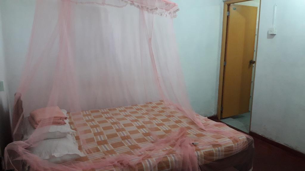 Sunray Rest - Beach View Homestay Мириса Стая снимка