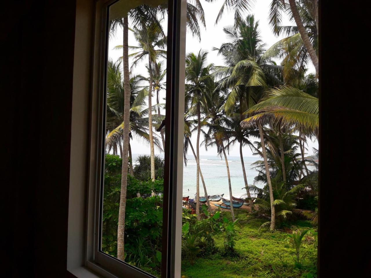 Sunray Rest - Beach View Homestay Мириса Екстериор снимка